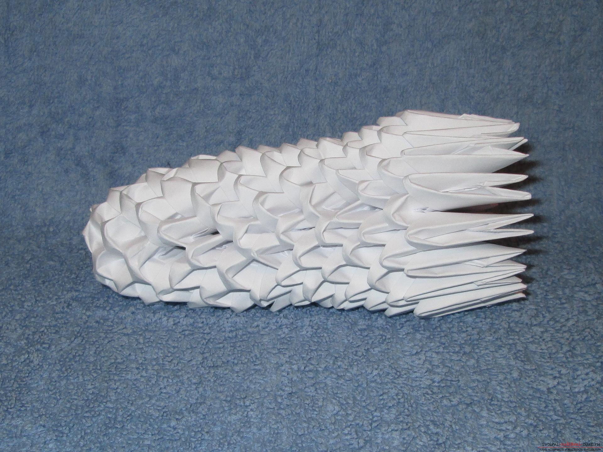 Если вы любите собирать модульное оригами, этот мастер-класс по созданию дельфина из бумаги для вас.. Фото №11